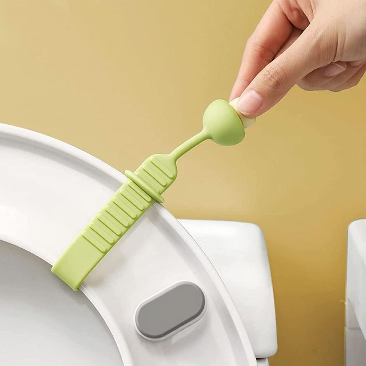LiftEase™ – Silicone Retractable Toilet Seat Lifter Band | Hygienic, Reusable, Washable Handle Grip for Any Size Lid (1 Pc).